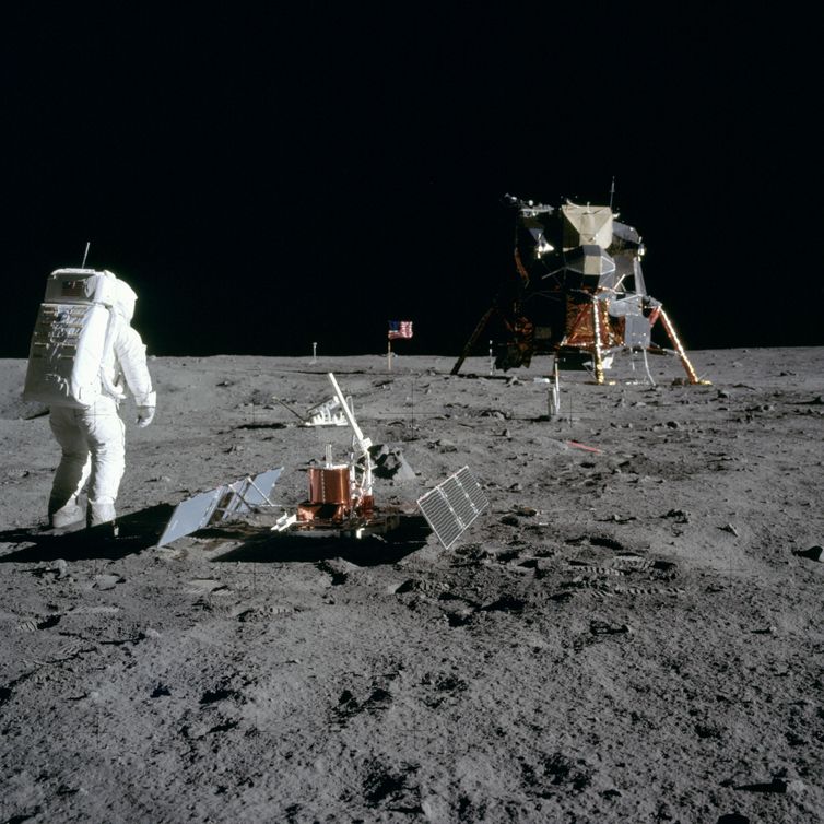 AS11-40-5948 (20 July 1969) --- Astronaut Edwin E. Aldrin Jr., lunar module pilot, is photographed during the Apollo 11 extravehicular activity (EVA) on the moon. He has just deployed the Early Apollo Scientific Experiments Package (EASEP). This