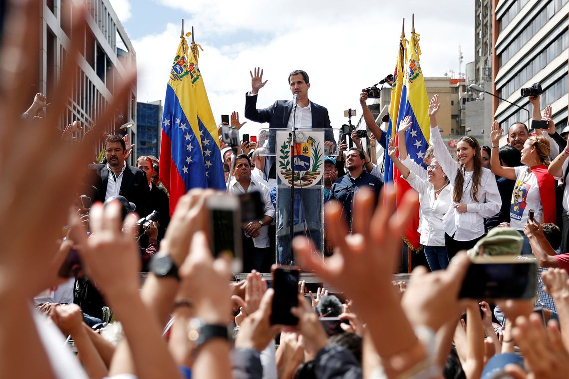 Juan Guaido, President of Venezuela&#039;s National Assembly, gestures during a rally against Venezuelan President Nicolas Maduro&#039;s government and to commemorate the 61st anniversary of the end of the dictatorship of Marcos Perez Jimenez in Caracas,