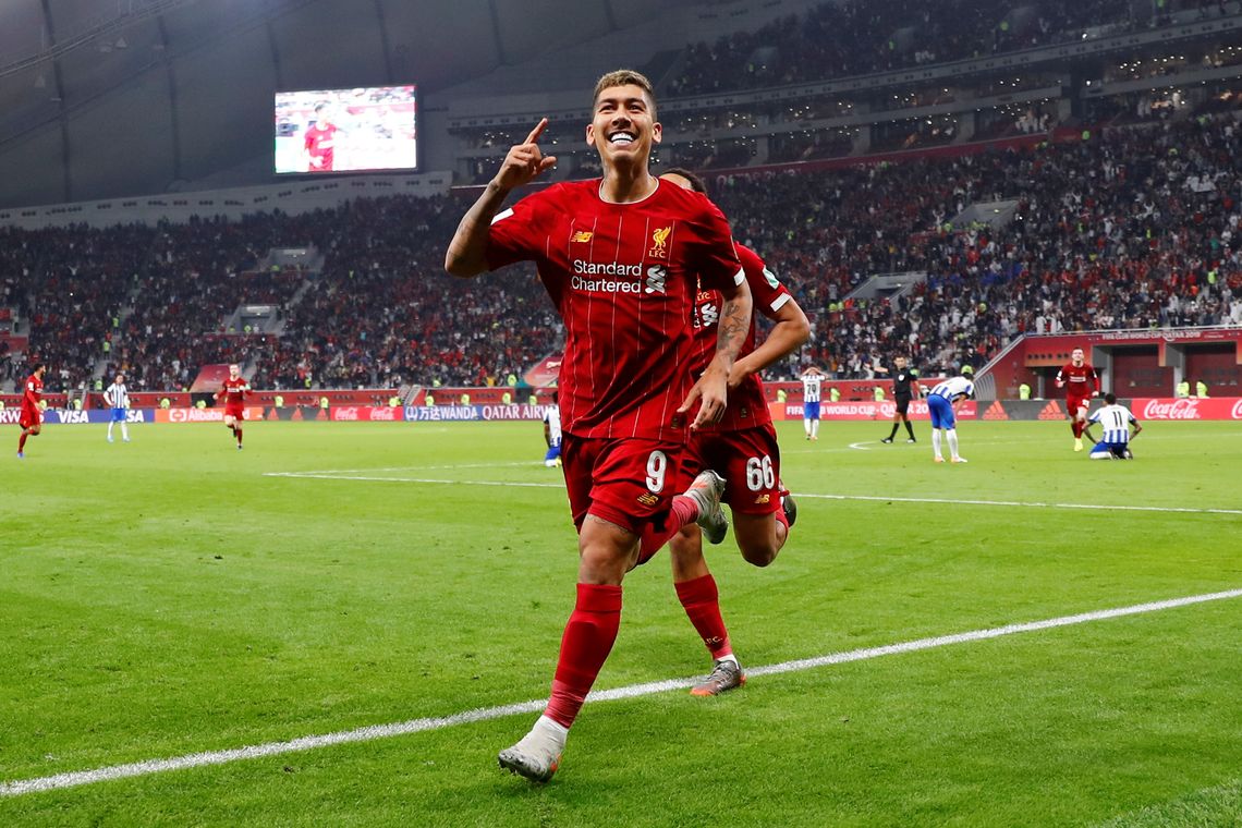 Soccer Football - Club World Cup - Semi Final - Monterrey v Liverpool - Khalifa International Stadium, Doha, Qatar - December 18, 2019 Liverpool's Roberto Firmino celebrates scoring their second goal REUTERS/Kai