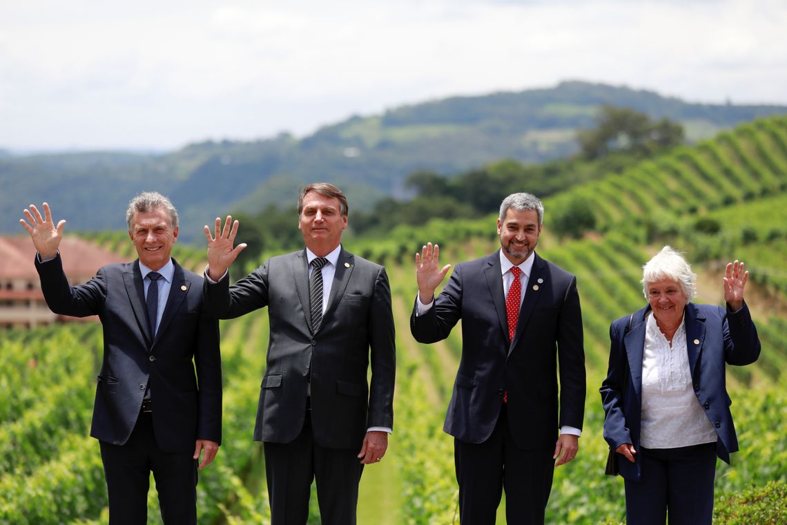 Argentina&#039;s President Mauricio Macri, Brazil&#039;s President Jair Bolsonaro, Paraguay&#039;s President Mario Abdo Benitez and Uruguay&#039;s Vice President Lucia Topolansky wave as they pose for a family picture during the Mercosur trade bloc summit, in 