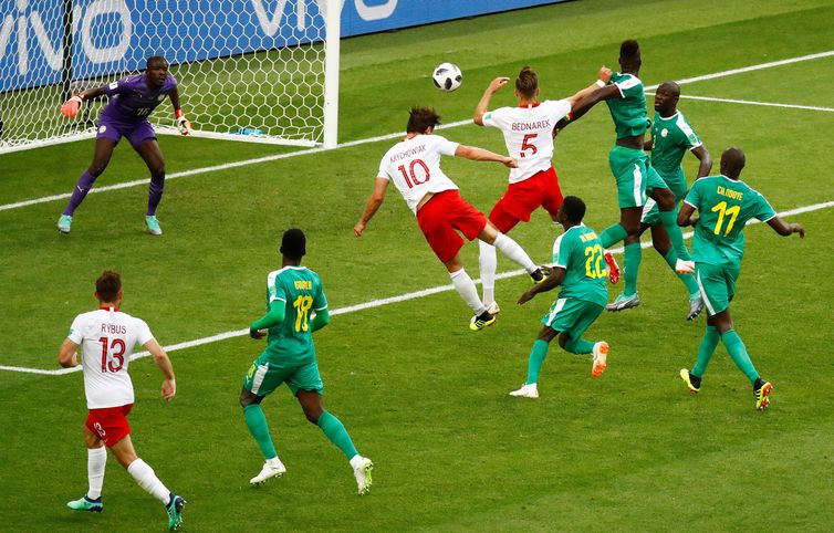 Copa 2018: Polônia e Senegal. Grzegorz Krychowiak, da Polônia, marca seu primeiro gol da equipe./Kai Pfaffenbach/Reuters/Direitos reservados Copa 2018: Polônia e Senegal. Grzegorz Krychowiak, da Polônia, marca seu primeiro gol da equipe.