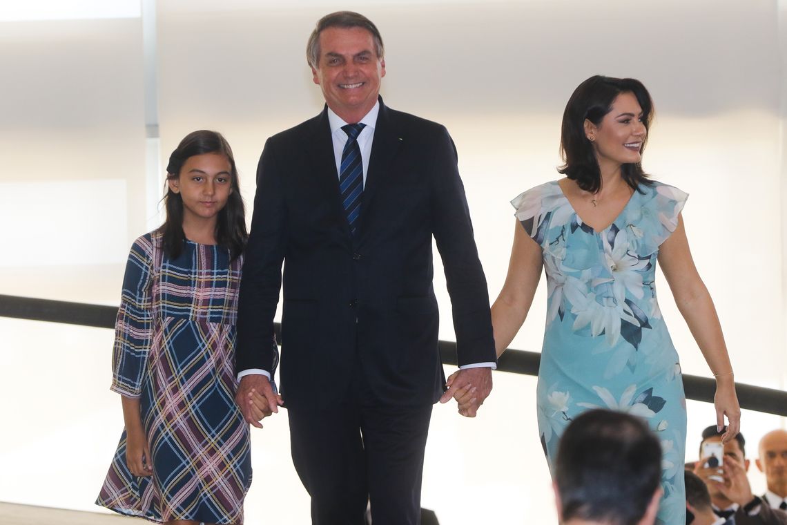 O presidente Jair Bolsonaro, sua filha Laura e a primeira dama Michele Bolsonaro, participam da Cantata de Natal no Palácio do Planalto