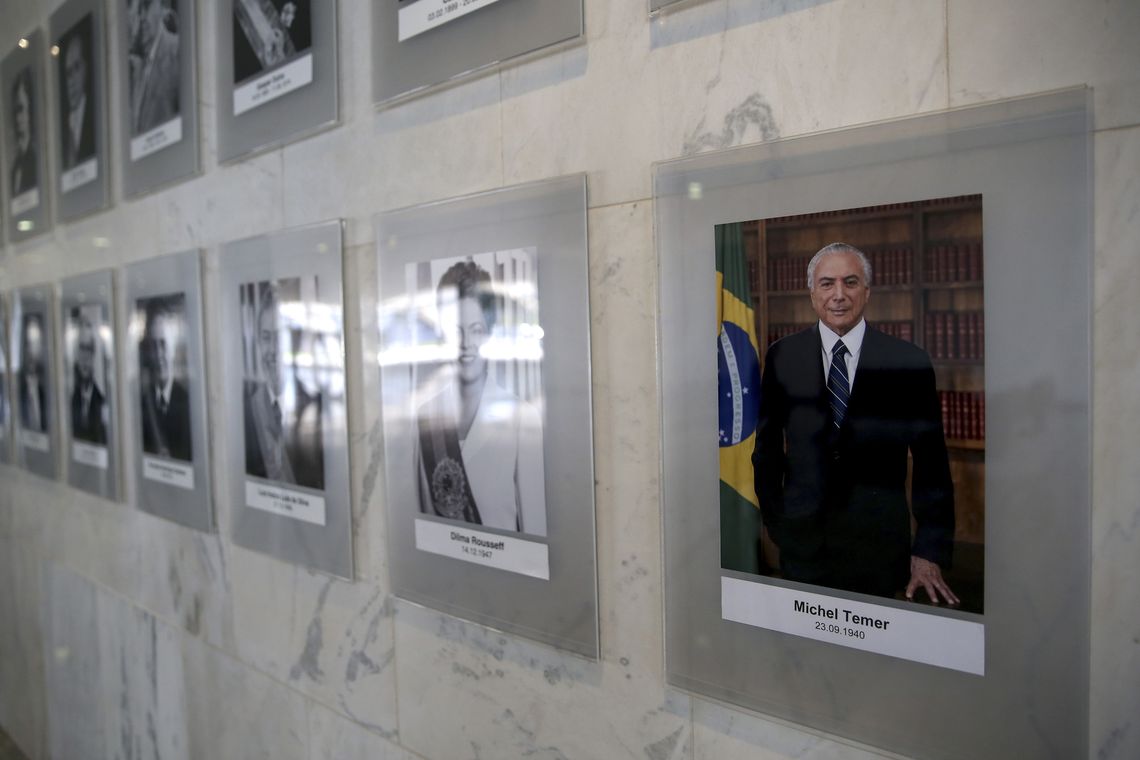 Wilson Dias/Agência Brasil Foto oficial do presidente Michel Temer é colocada na galeria de Presidentes da República, no Palácio do Planalto.