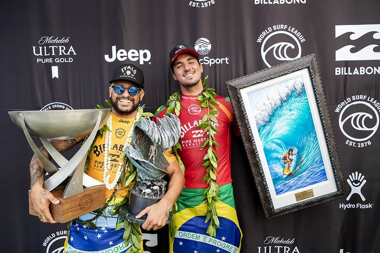 OAHU, UNITED STATES - DECEMBER 19: (L-R) Italo Ferreira of Brazil winner of his maiden WSL World Title and his maiden 2019 Billabong Pipe Masters and Two-time WSL Champion Gabriel Medina of Brazil runner-up at Pipeline on December 19, 2019 in