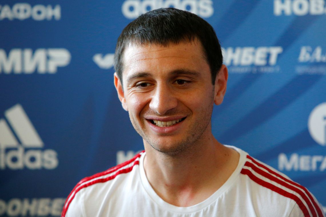 Sergei Karpukhin/Reuters/Direitos reservados Soccer Football - World Cup - Russia Press Conference - Russia Training Camp, Moscow, Russia - June 17, 2018 Russia's Alan Dzagoev during the press conference REUTERS/Sergei Karpukhin