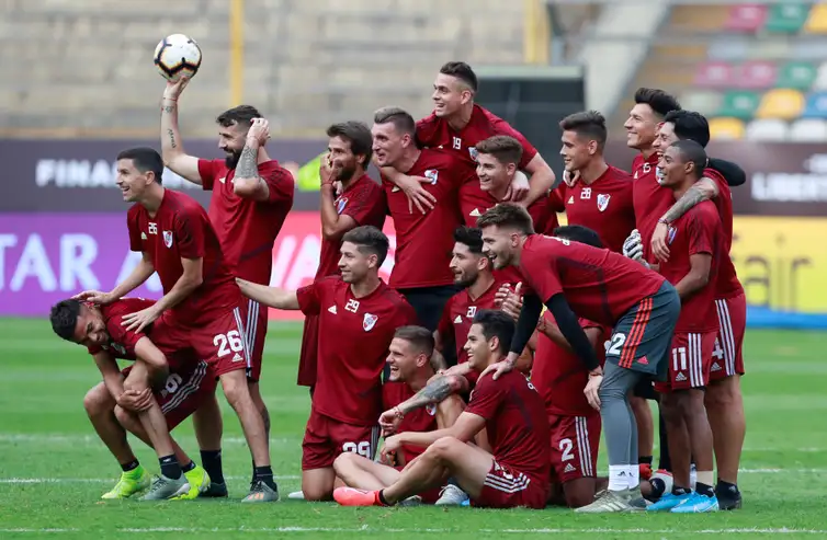 Soccer Football - Copa Libertadores - River Plate Stadium Visit - Monumental Stadium, Lima, Peru - November 22, 2019 River Plate players pose for a team group photo during training REUTERS/Henry Romero