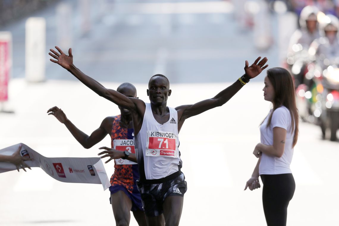 Kibiwott Kandie of Kenya crosses the finish line after passing Uganda&#039;s Jacob Kiplimo at the last moment to win the annual &quot;Sao Silvestre Run&quot;, an international race through the streets of Sao Paulo, Brazil December 31, 2019. REUTERS/Amanda