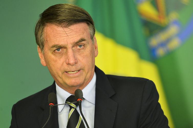 O presidente Jair Bolsonaro durante cerimônia de assinatura do decreto que flexibiliza a posse de armas no paÃs.