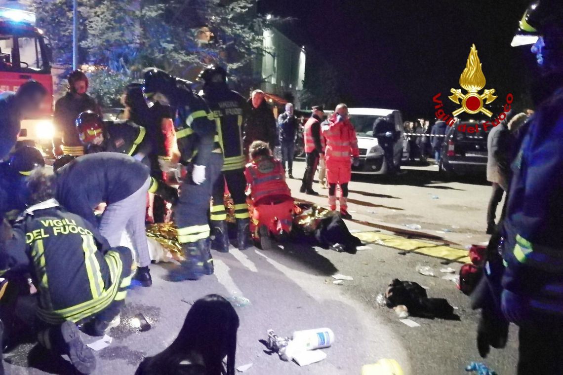 Corinaldo (Italy), 08/12/2018.- A handout photo made available by the Italian Fire Department (Corpo Nazionale Vigili Del Fuoco) shows emergency personnel attending the victims of a stampede at a nightclub in Corinaldo, near Ancona, Mache Region