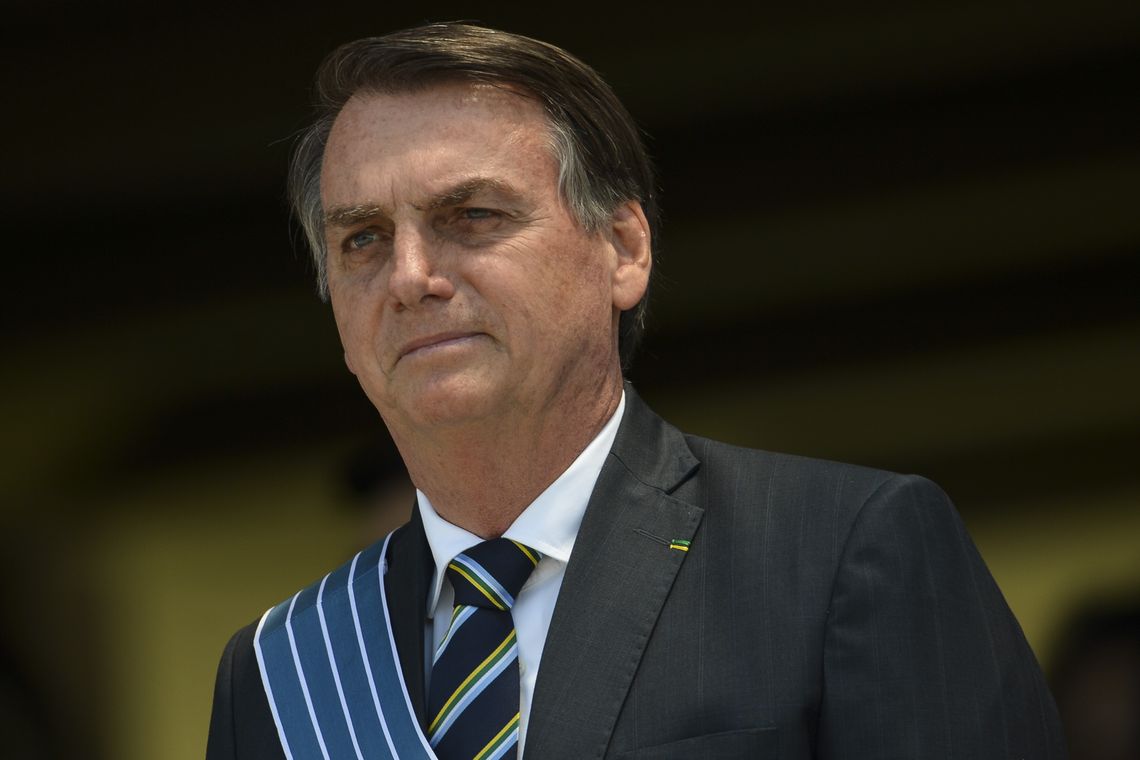 O presidente Jair Bolsonaro participa da cerimônia comemorativa ao Dia do Aviador e ao Dia da Força Aérea, em Brasília.