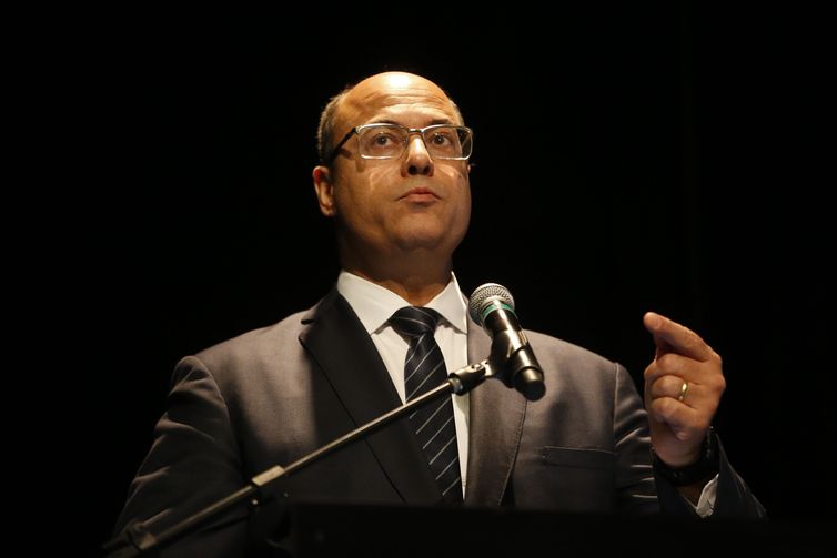 Tânia Rêgo/Agência Brasil Cerimônia de transmissão do cargo de presidente do Banco Nacional de Desenvolvimento Econômico e Social (BNDES) para Joaquim Levy, no auditório do BNDES. Na foto, o governador do Rio, Wilson Witzel.