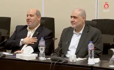 Senior Hamas official Khalil Al-Hayya gestures as he attends a meeting with Egyptian, Qatari and Turkish delegations ahead of a Gaza ceasefire deal announcement, in Sharm El-Sheikh, Egypt, October 8, 2025, in this still image obtained from a video. Al-Qahera News/Handout via REUTERS THIS IMAGE HAS BEEN SUPPLIED BY A THIRD PARTY. EGYPT OUT. NO COMMERCIAL OR EDITORIAL SALES IN EGYPT. MUST NOT OBSCURE LOGO.