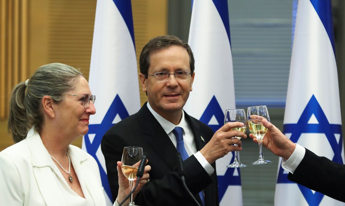 President-elect Isaac Herzog and his wife Michal celebrate after a special session of the Knesset whereby Israeli lawmakers elected the new president, at the Knesset, Israel's parliament, in Jerusalem