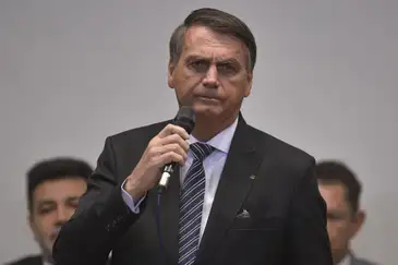 O presidente Jair Bolsonaro participa do Culto de Santa Ceia da Frente Parlamentar Evangélica, no Auditório Nereu Ramos da Câmara dos Deputados.