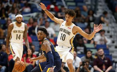 Oct 11, 2019; New Orleans, LA, USA; Utah Jazz guard Donovan Mitchell (45) dribbles against New Orleans Pelicans center Jaxson Hayes (10) in the second quarter at the Smoothie King Center. Mandatory Credit: Chuck Cook-USA TODAY Sports