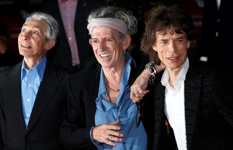 FILE PHOTO: Rolling Stones members Watts, Richards and Jagger arrive for the world premiere of 