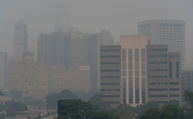 Smoke from active wildfires in Ontario, Canada and northern Minnesota obscures the downtown Detroit skyline on Thursday, July 16, 2026.