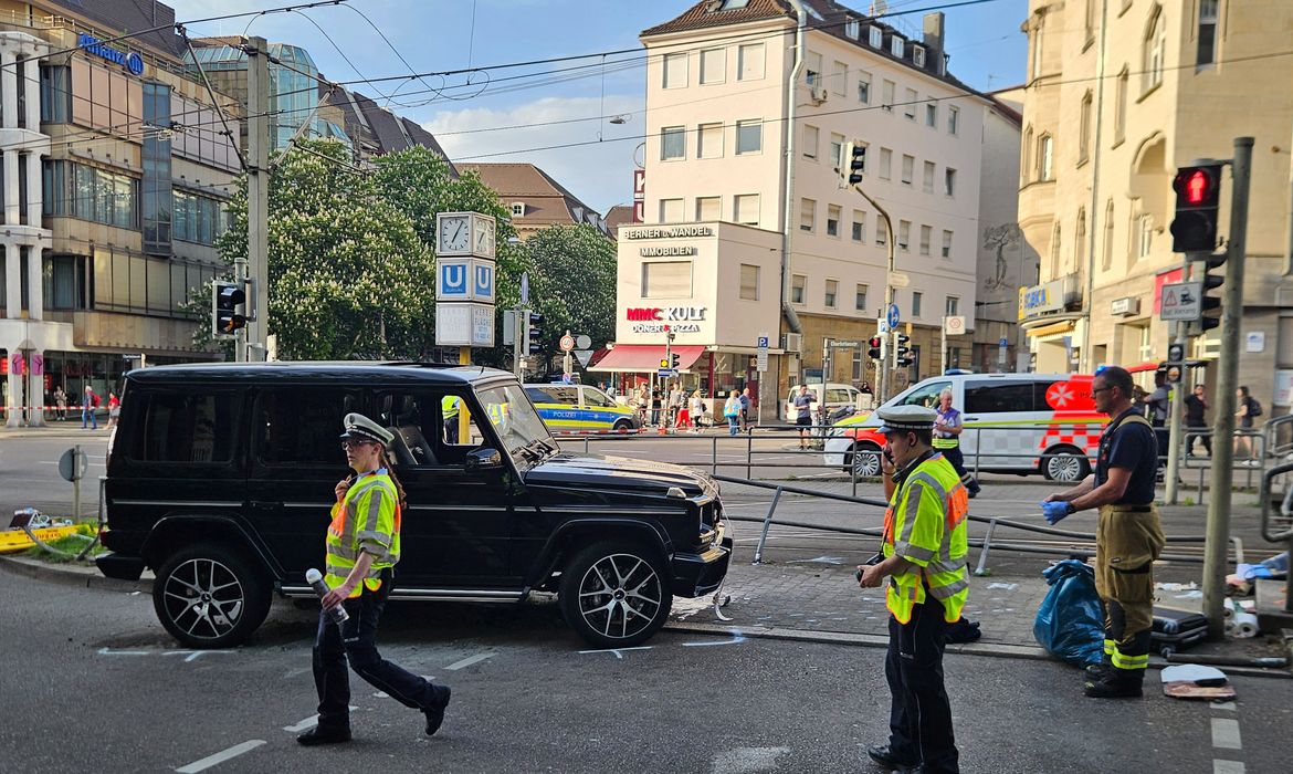 Police and fire fighters work at the scene after several people were injured, some seriously, after a car drove into a crowd in the centre of the southwestern German city of Stuttgart, Germany, May 2, 2025.    REUTERS/stringer