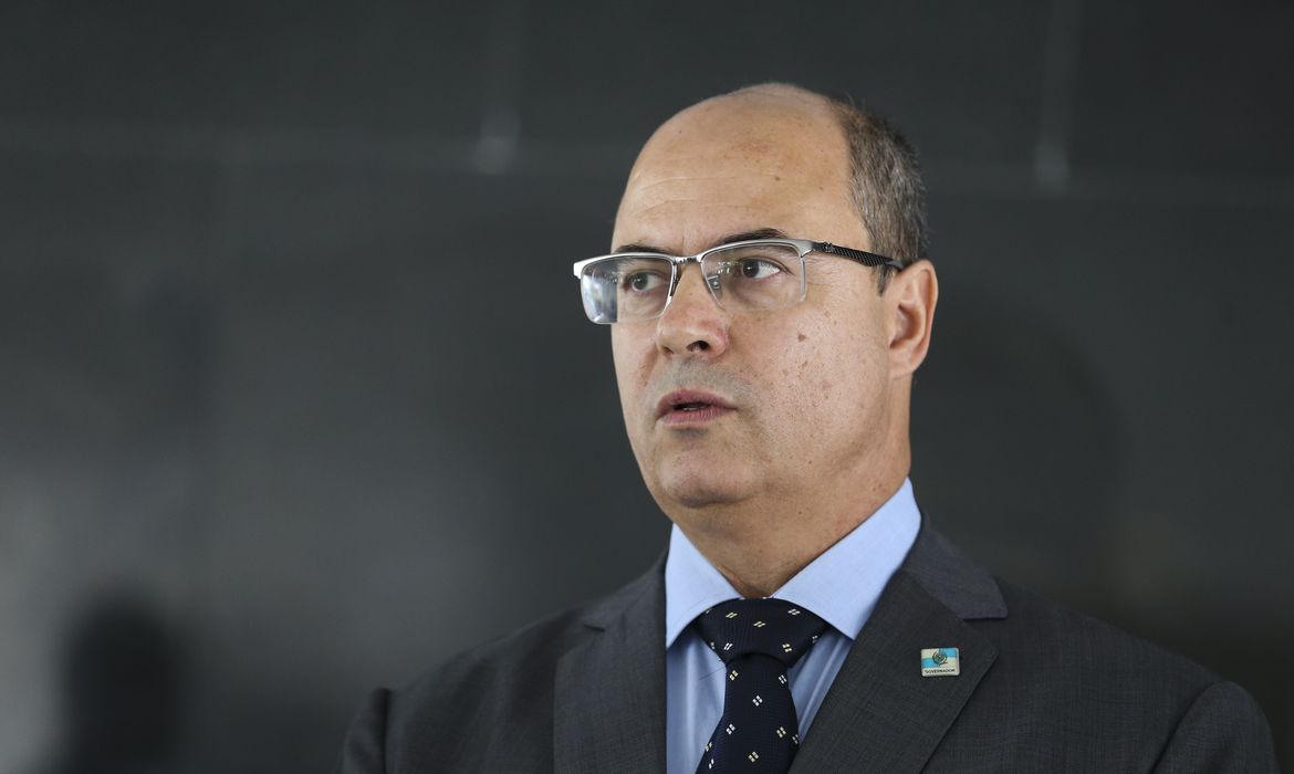O governador do Rio de Janeiro, Wilson Witzel, fala à imprensa após reunião com o presidente da República, Jair Bolsonaro, no  Palácio do Planalto.
