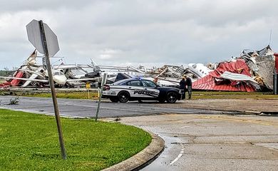 Social media images of damaged planes and buildings in the aftermath of a tornado in Monroe, Louisiana