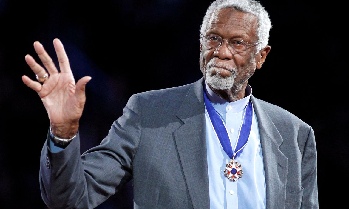 FILE PHOTO: Celtics' legend Russell stands with his Presidential Medal of Freedom during the NBA All-Star basketball game in Los Angeles
