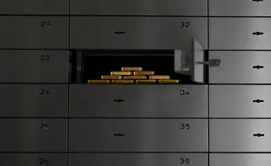 Gold bars of various values are stored in a safe deposit room in Munich, Germany, January 28, 2026. REUTERS/ Angelika Warmuth