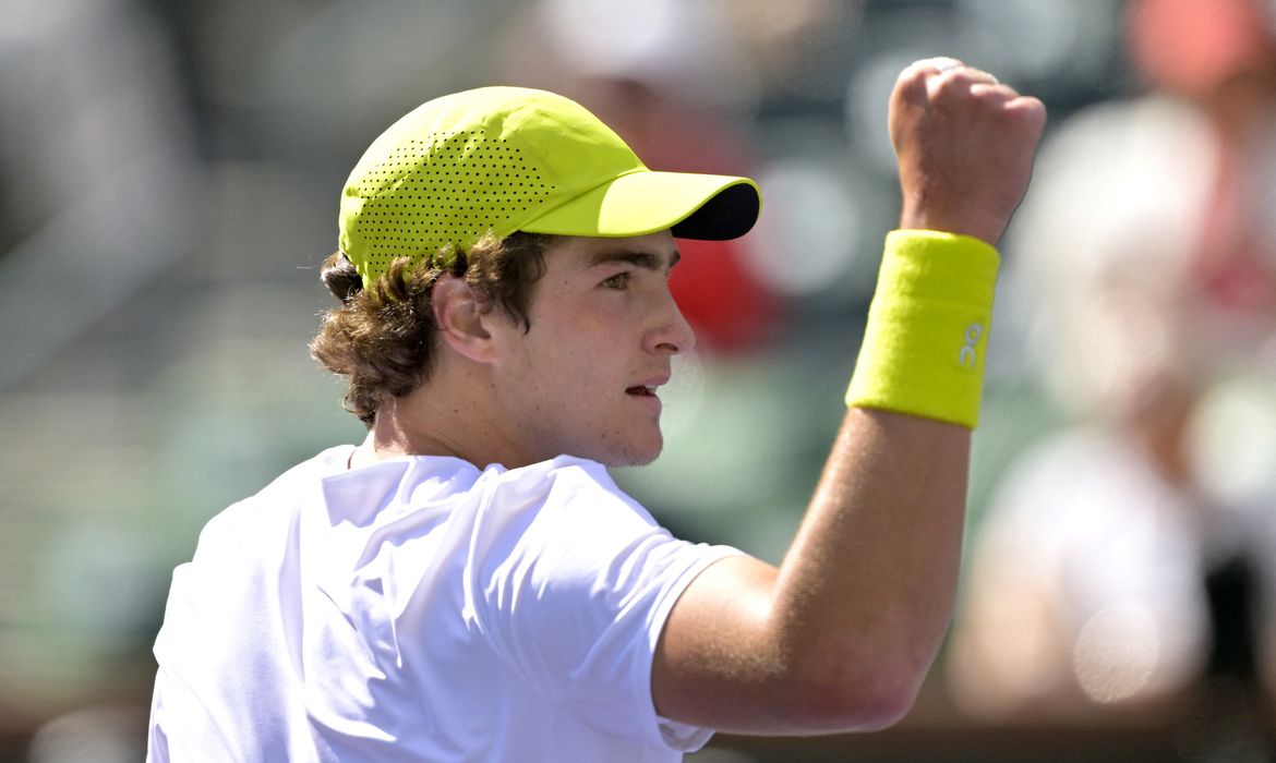 Mar 6, 2025; Indian Wells, CA, USA;  Joao Fonseca (BRA) reacts shot during his first round match as he defeated Jacob Fearnley (not pictured) in the BNP Paribas Open at the Indian Well Tennis Garden. Mandatory Credit: Jayne Kamin-Oncea-Imagn Images