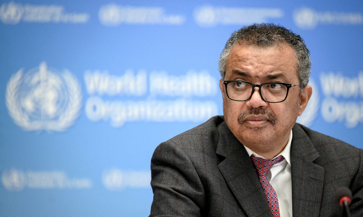 FILE PHOTO: World Health Organization chief Tedros Adhanom Ghebreyesus attends a ceremony to launch a multiyear partnership with Qatar on making FIFA Football World Cup 2022 and mega sporting events healthy and safe at the WHO headquarters, in Geneva, Switzerland, October 18, 2021. Fabrice Coffrini/ Pool via REUTERS/File Photo