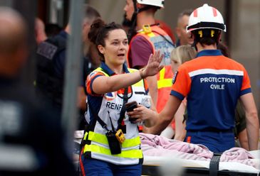 A member of rescue forces works after several buildings went on fire following a gas explosion in the fifth arrondissement of Paris, France, June 21, 2023. REUTERS/Gonzalo Fuentes