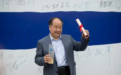 Chinese novelist and winner of the 2012 Nobel Prize in Literature Guan Moye, better known by his pen name Mo Yan, receives the 