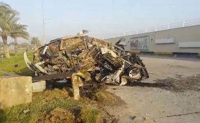 A damaged car, claimed to belong to Qassem Soleimani and Abu Mahdi al Muhandis, is seen near Baghdad International Airport, Iraq January 3, 2020 in this still image taken from video. Ahmad Al Mukhtar/via REUTERS ATTENTION EDITORS - THIS IMAGE
