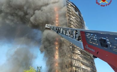 Fire rages through Milan residential tower block