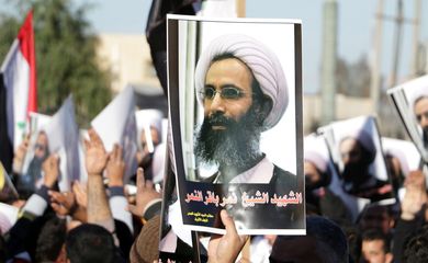 Protesto no Iraque contra a execução do líder regligioso xiite Nimr al-Nimr pela Arábia Saudita