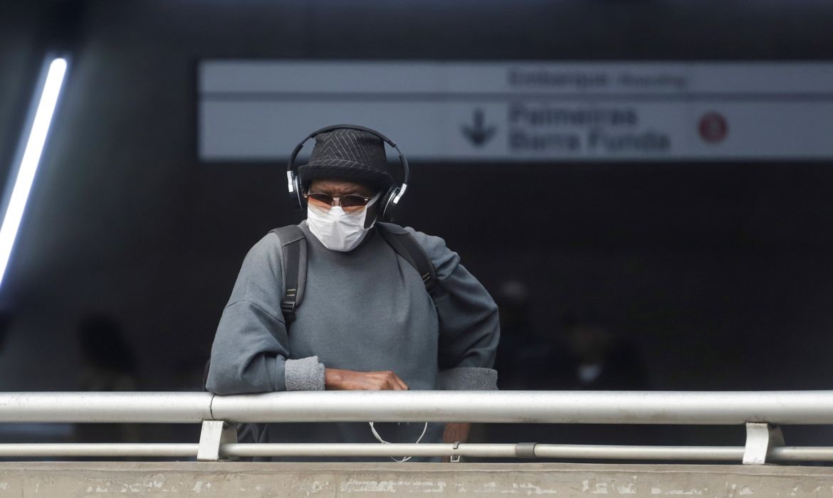A man wears a protective face mask at a subway station after reports of the coronavirus in Sao Paulo
