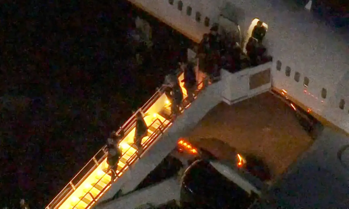 Venezuela's President Nicolas Maduro is led in custody from a U.S. federal airplane before his scheduled court appearance at Manhattan federal court, at Stewart Air National Guard Base in Newburgh, New York, U.S. January 3, 2026.  ABC Affiliate WABC via REUTERS
NO RESALES. NO ARCHIVES. THIS IMAGE HAS BEEN SUPPLIED BY A THIRD PARTY. MANDATORY CREDIT