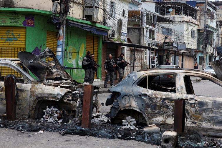 Members of the military police special unit patrol a street during a police operation against drug trafficking at the favela do Penha, in Rio de Janeiro, Brazil October 28, 2025. REUTERS/Aline Massuca