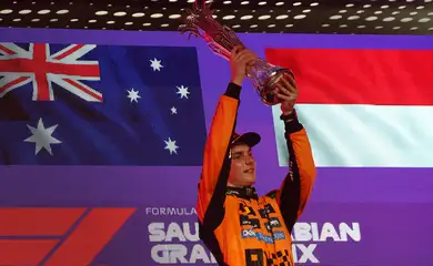 Formula One F1 - Saudi Arabian Grand Prix - Jeddah Corniche Circuit, Jeddah, Saudi Arabia - April 20, 2025
McLaren's Oscar Piastri celebrates with the trophy on the podium after winning the Saudi Arabian Grand Prix REUTERS/Jakub Porzycki