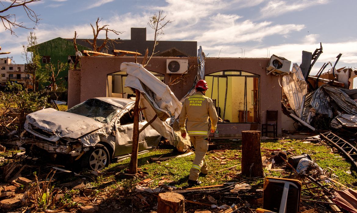 Priscila Ribeiro/Proibida reprodução A military firefighter walks next to a house, destroyed by the tornado that hit Rio Bonito do Iguacu, in southern Parana state, Brazil November 9, 2025. REUTERS/Priscila Ribeiro