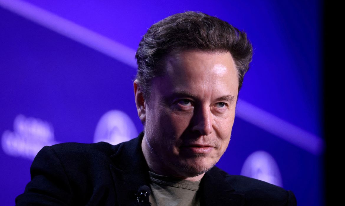 FILE PHOTO: Elon Musk, CEO of SpaceX and Tesla and owner of X looks on during the Milken Conference 2024 Global Conference Sessions at the Beverly Hilton in Beverly Hills, California, U.S., May 6, 2024. REUTERS/David Swanson//File Photo