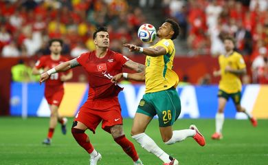 Soccer Football - FIFA World Cup 2026 - Group D - Australia v Turkey - BC Place, Vancouver, Canada - June 13, 2026 Australia's Tete Yengi in action with Turkey's Abdulkerim Bardakci REUTERS/Albert Gea