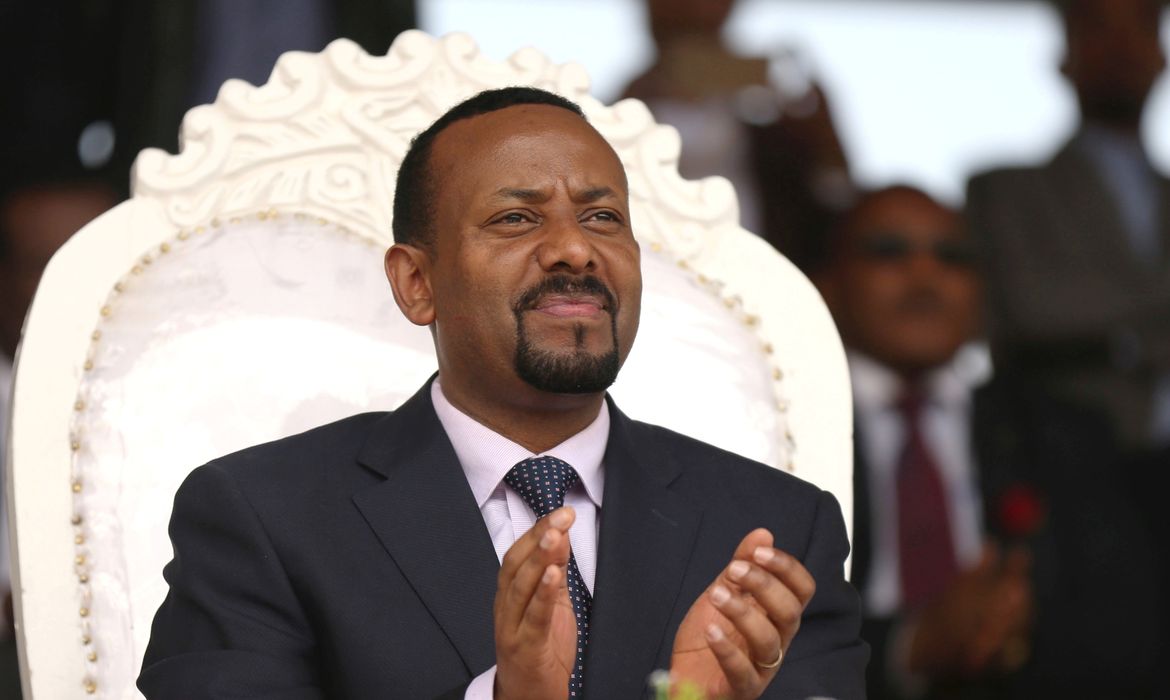 FILE PHOTO: Ethiopia's newly elected prime minister Abiy Ahmed attends a rally during his visit to Ambo in the Oromiya region, Ethiopia April 11, 2018. REUTERS/Tiksa Negeri/File Photo