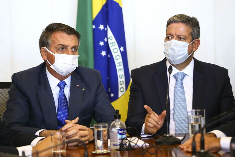 O presidente Jair Bolsonaro durante reunião para entrega da medida provisória do novo Bolsa Família ao presidente da Câmara, Arthur Lira. O programa se chamará Auxílio Brasil.