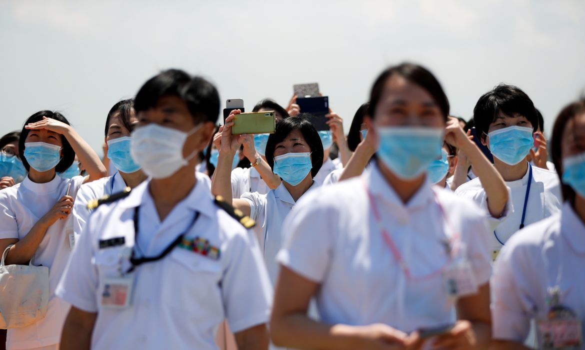 Japan Air Self-Defense Force stages a flyover to salute the medical workers at the frontline of the fight against the coronavirus disease (COVID-19), in Tokyo