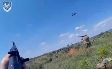 FILE PHOTO: Ukrainian soldiers shoot at what a source from Ukraine's Presidential Office says are Lancet drones, in this still image taken from handout video released on May 31, 2023.  Defence Ministry Of Ukraine/Handout via REUTERS   ATTENTION EDITORS - THIS IMAGE HAS BEEN SUPPLIED BY A THIRD PARTY. REUTERS IS UNABLE TO INDEPENDENTLY VERIFY THIS IMAGE. BEST QUALITY AVAILABLE./File Photo