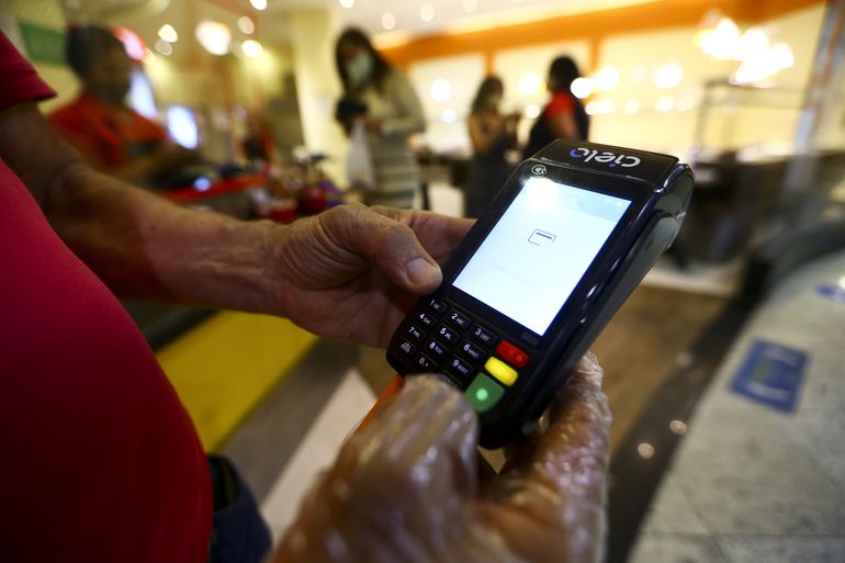 Pagamento em cartão.
Foto: Marcelo Camargo/Agência Brasil/Arquivo