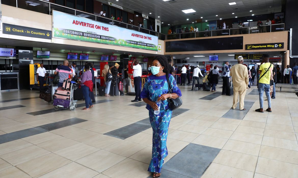 A woman wears a protective face mask due to the spread of the coronavirus disease (COVID-19), at the Murtala Mohammed International airport in Lagos