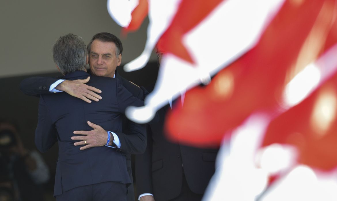 O presidente Jair Bolsonaro recebe o presidente da Argentina, Mauricio Macri, no Palácio do Planalto. 