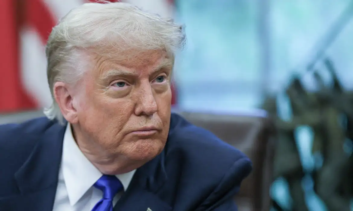 FILE PHOTO: U.S. President Donald Trump looks on as he signs executive orders and proclamations in the Oval Office at the White House, in Washington, D.C., U.S., May 5, 2025. REUTERS/Leah Millis/File Photo