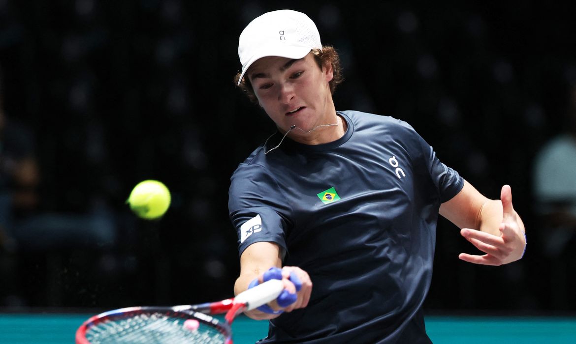 Tennis - Davis Cup - Group A - Belgium v Brazil - Unipol Arena, Bologna, Italy - September 14, 2024     Brazil's Joao Fonseca in action during his singles match against Belgium's Raphael Collignon REUTERS/Claudia Greco