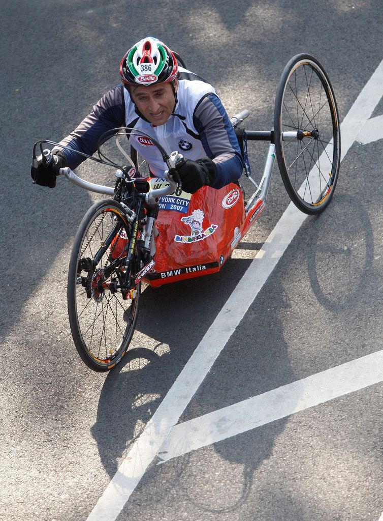 FILE PHOTO: Italian Race car driver Alex Zanardi crosses the finish line in the Handcycle Division during the 2007 ING New York City Marathon in New York